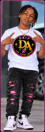 Youth model wearing a white Drip Avenue DA awareness shirt, distressed black jeans, and white sneakers