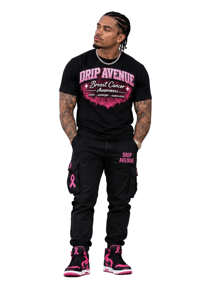 Full-body male model wearing a black Drip Avenue Breast Cancer Awareness shirt, black cargo pants, and black and pink sneakers